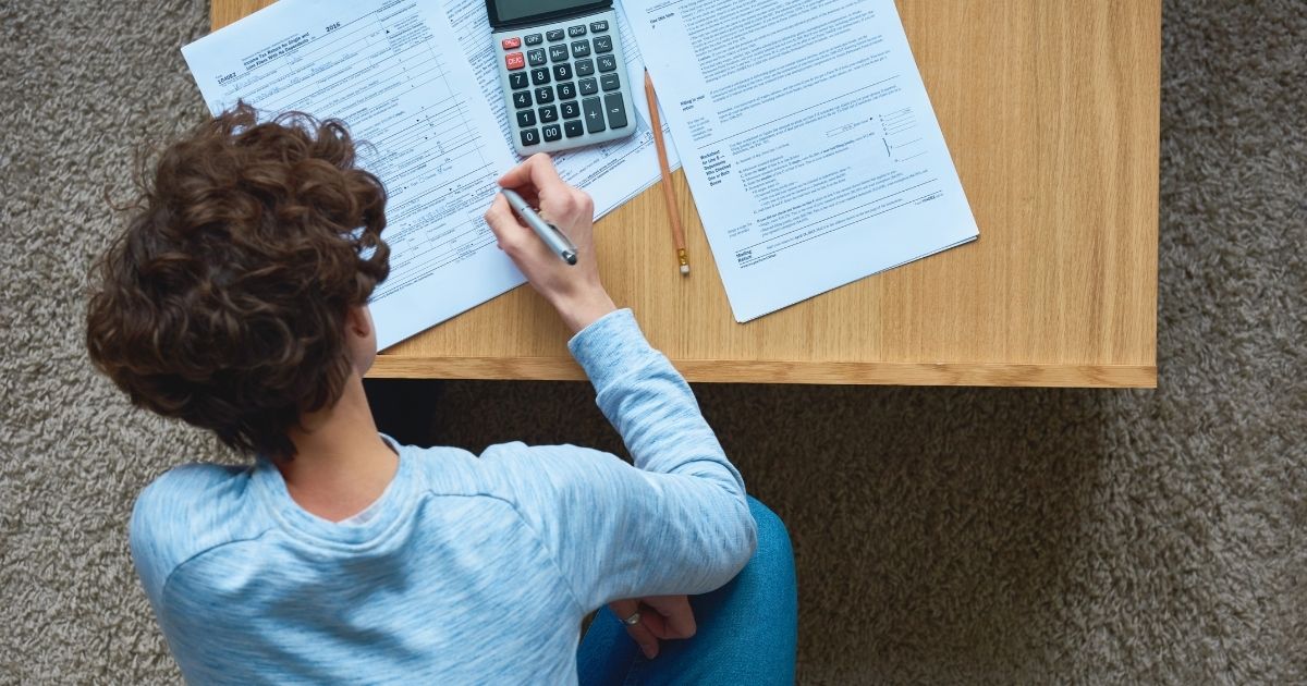 person paying taxes in Finland