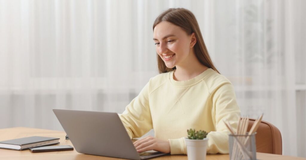 smiling woman comparing costs of best esim for Czech Republic