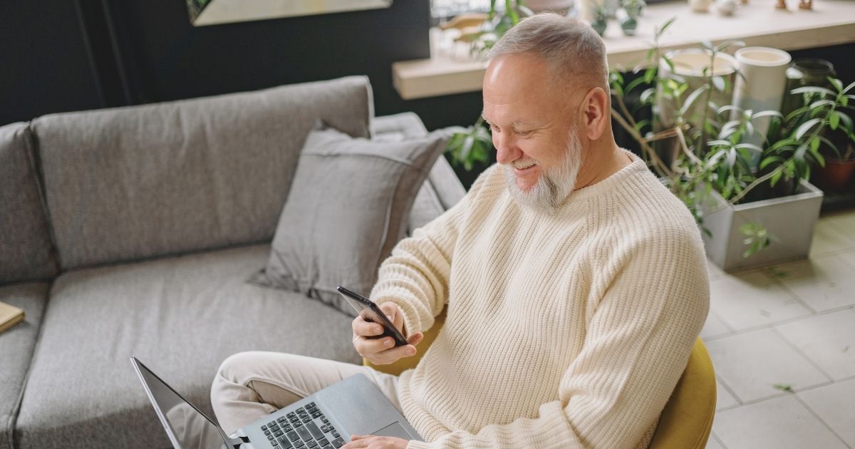 man comparing Holafly vs Kolet esim