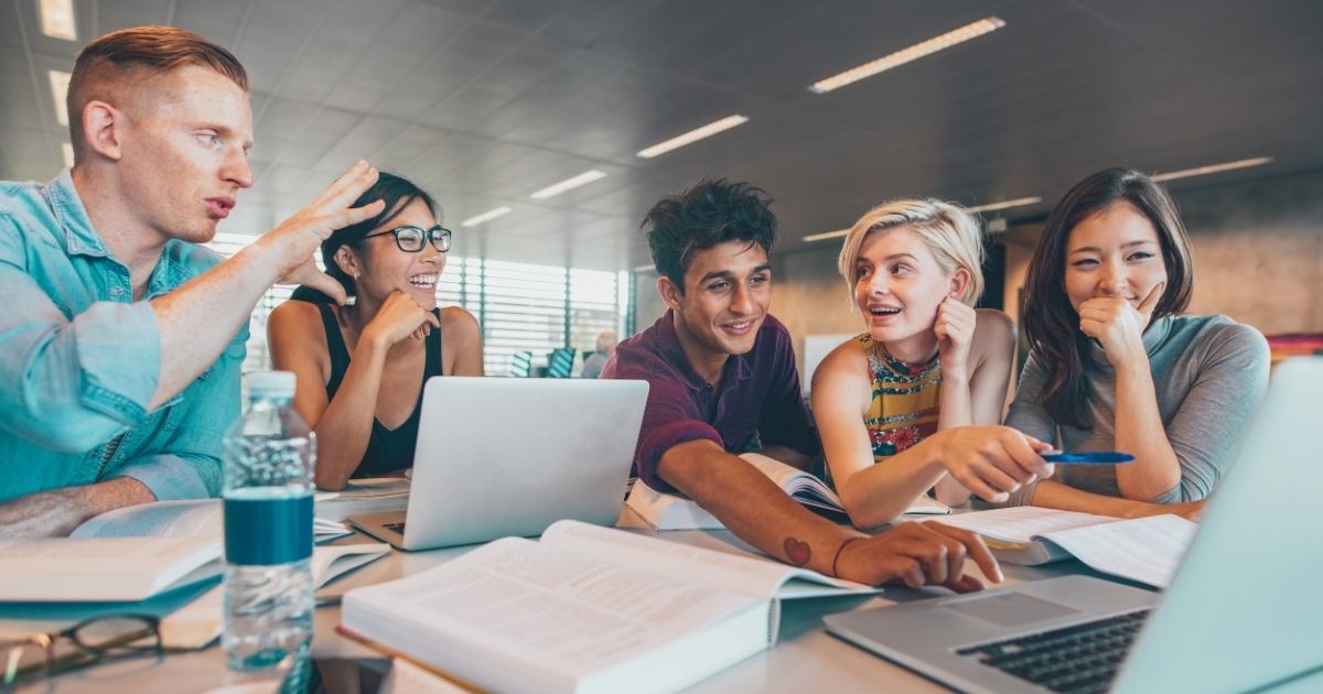 students using internet in their laptops at the university