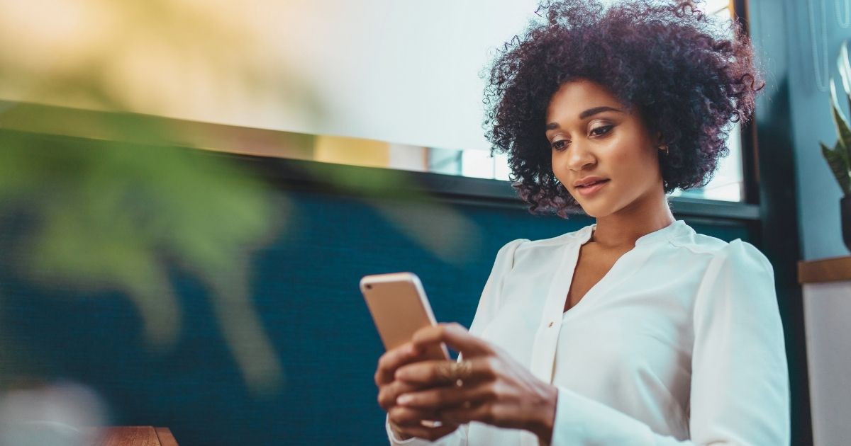 woman looking Nomad esim review