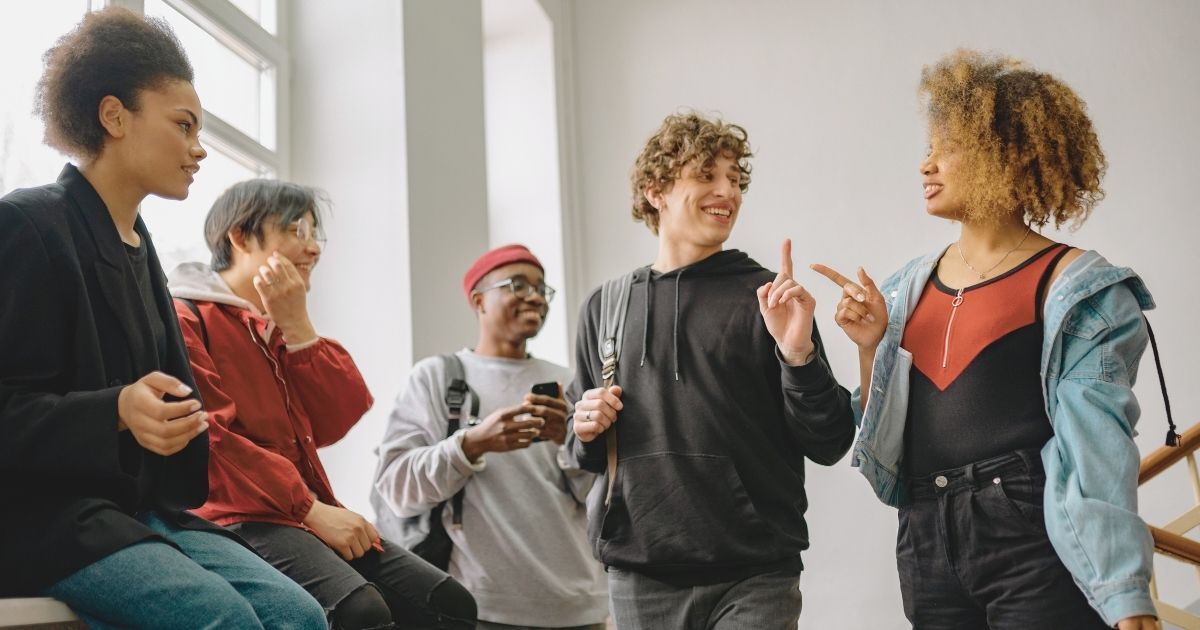 students hanging out at the university